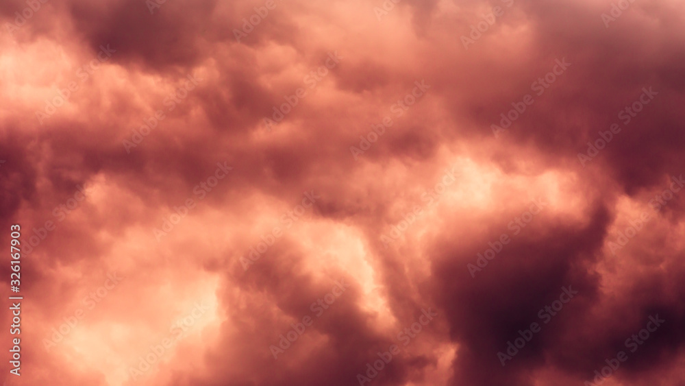 Dramatic stormy dark red green cloudy sky, natural photo background