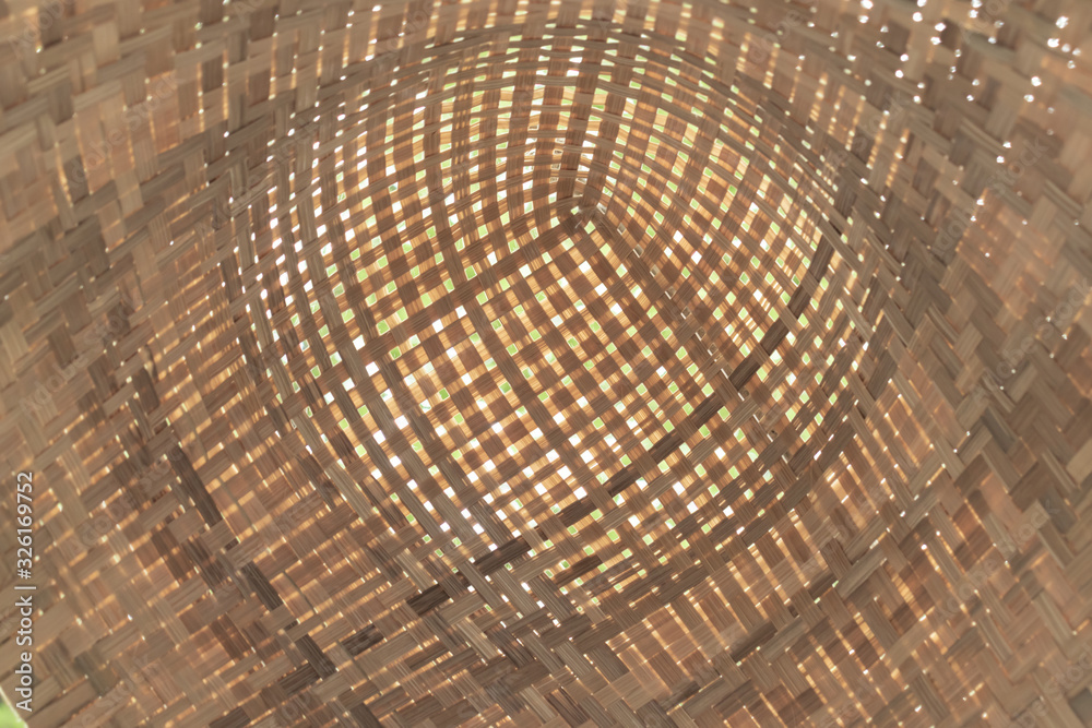Fototapeta premium Straw brown wickered canopy, sunshade close up