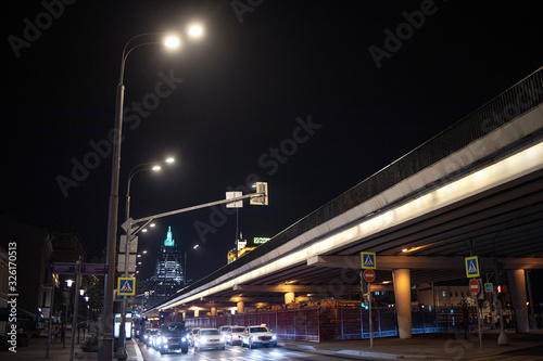 Russia  Moscow - September 8  2019  Night crossroad. Cars on the road. Big city night life. City street. Beautiful view of downtown. Blurred concept...