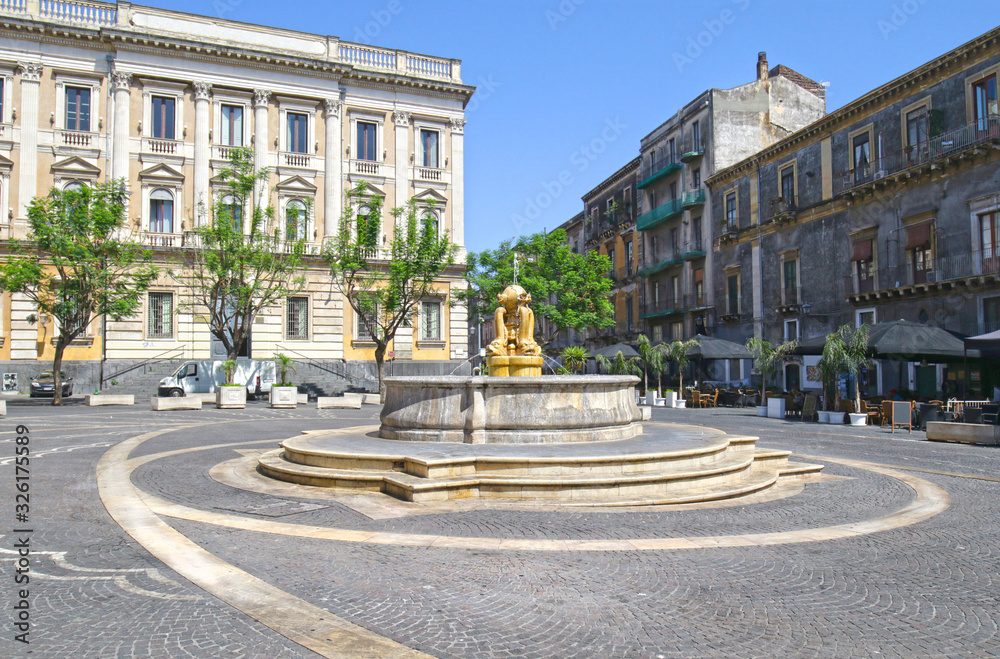 Water Fountain of Dolphins in Piazza Teatro Massimo, Catania, Sicily.  Italy