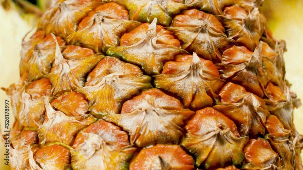 Macro dolly video of pineapple pulp and skin. Perfect abstract shot for organic food and healthy nutrition. Closeup of tropical fruits Macro dolly video of pineapple pulp and skin. Perfect abstract shot for organic food and healthy nutrition. Closeup of tropical fruits