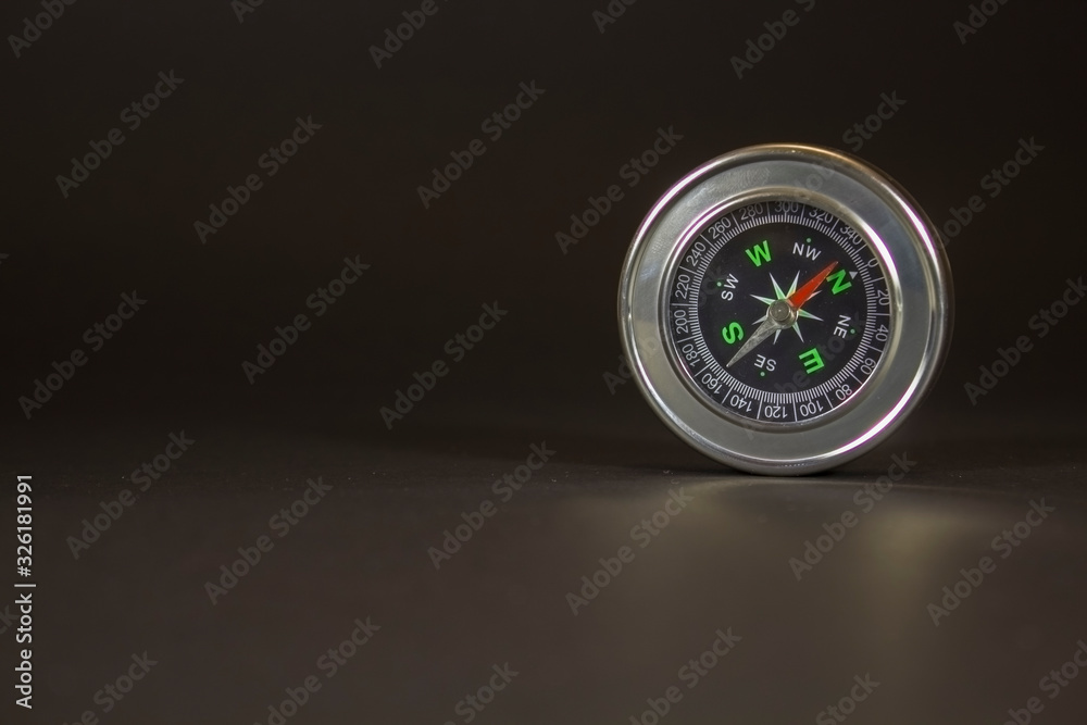 Compass on black board background Compass on black board background