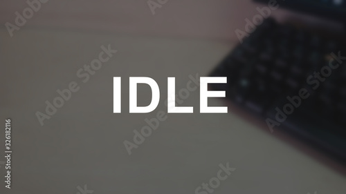 Konstfotografi IDLE word with blurring business background