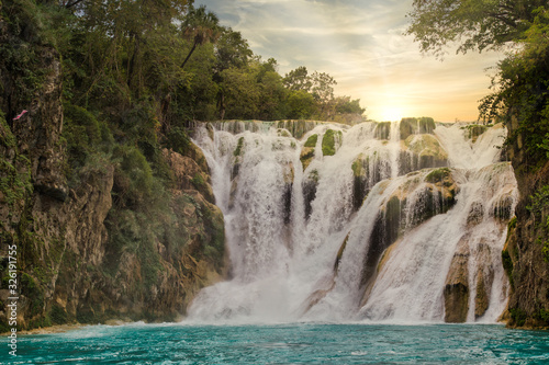 Unbelievable summer morning scene on the Waterfall (EL SALTO-EL MECO) san luis potosi Mexico,Colorful sunrise . Beauty of nature concept background. photo