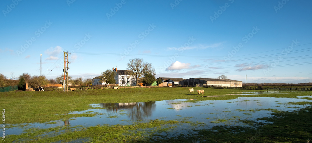 Farm with flood water on fields