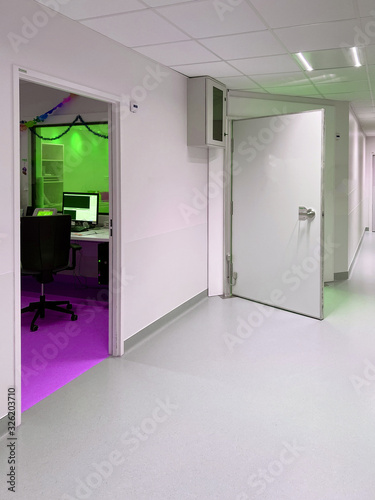 Open door of new IRM MRI Magnetic resonance imaging room in ultra modern hospital photo