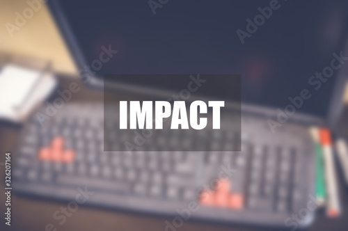 Impact word with blurring business background