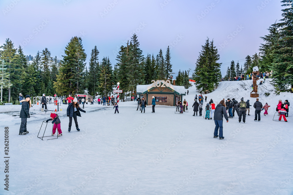 Vancouver, British Columbia, Canada - December 31st, 2019 - Having fun with lots of snow at Grouse Mountain.