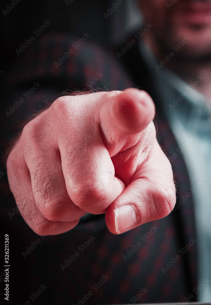 Obraz premium Man pointing with his finger