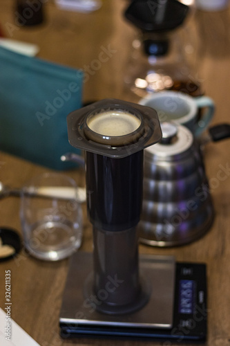 Aeropress, steel scales, coffee. Stylish accessories and items for alternative coffee