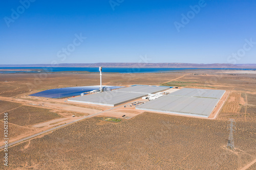 Solar powered greenhouse facility growing tomatoes and fruit, located outside Port Augusta in South Australia photo