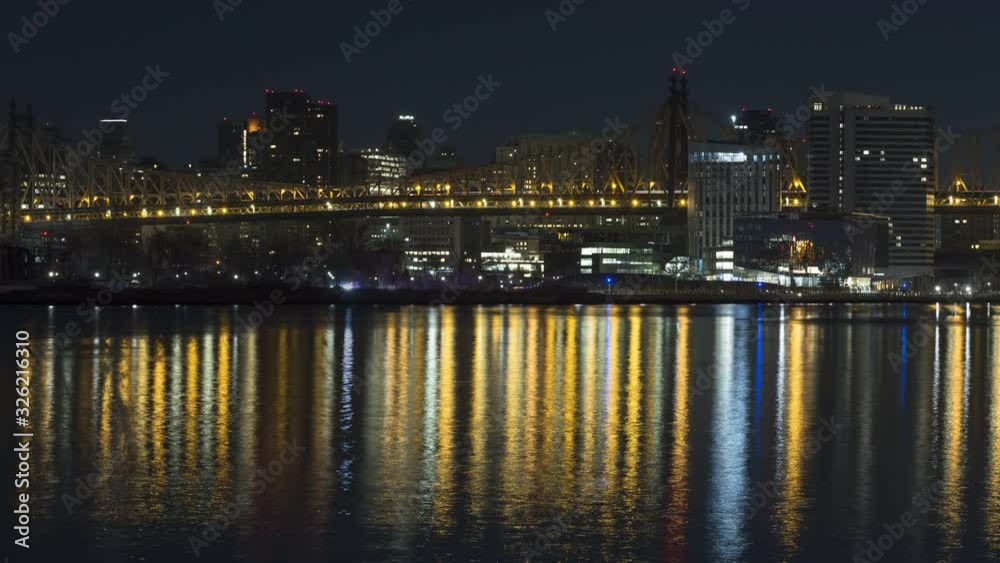 Queensboro Bridge and Roosevelt island from East river night to day timelapse Queensboro Bridge and Roosevelt island from East river night to day timelapse