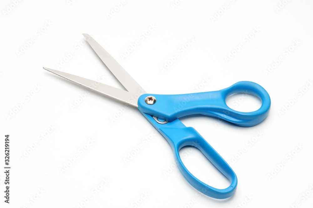 Tailors scissors on a white background Tailors scissors on a white background
