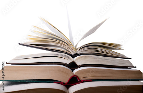 open book on white background with shallow depth of field