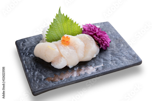 Sliced Japanese food scallop with salmon roe on top sashimi dinner meal isolated on white background