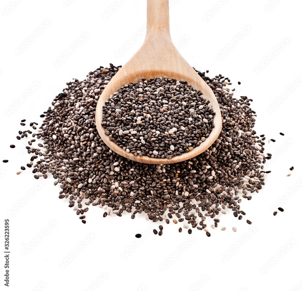 Chia seeds in a wooden spoon isolated on a white background. Top view. Chia seeds in a wooden spoon isolated on a white background. Top view.