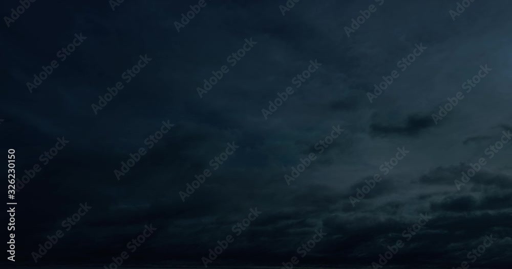 Thunderstorm clouds at night with lightning. 4K Timelapse Loop. night storm cloud landscape. Impressive lightning storm sky. Several powerful flashes and lights.