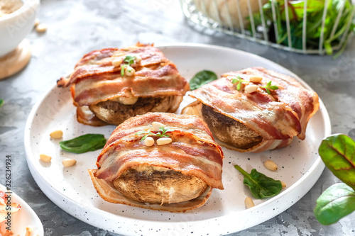 Baked mushrooms stuffed with cheese and pine nuts