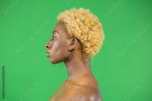 Body care cosmetics.Portrait of young woman with beautiful yellow hair.Natural Healthy Skin.