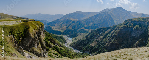 Beautiful panorama view to sunny mountains in Georgia 