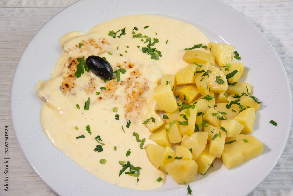 Chicken breast with cream sauce and nature potatoes Chicken breast with cream sauce and nature potatoes
