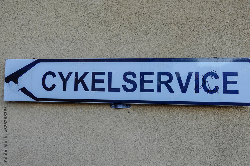 Norrtalje, Sweden A sign in Swedish giving directions to a bicycle workshop. Norrtalje, Sweden A sign in Swedish giving directions to a bicycle workshop.