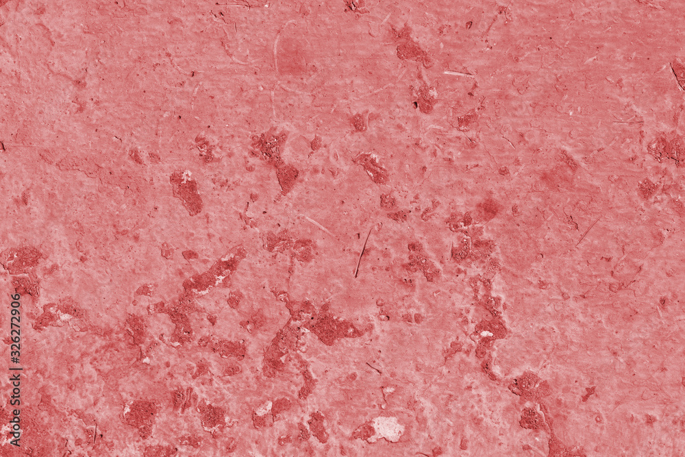 Old asphalt surface close up. Abstract background red color toned Old asphalt surface close up. Abstract background red color toned