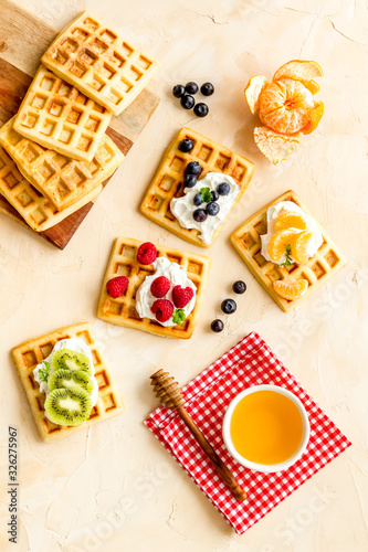 Wallpaper Mural Belgian waffles with creamy cheese and berries on beige background top-down Torontodigital.ca