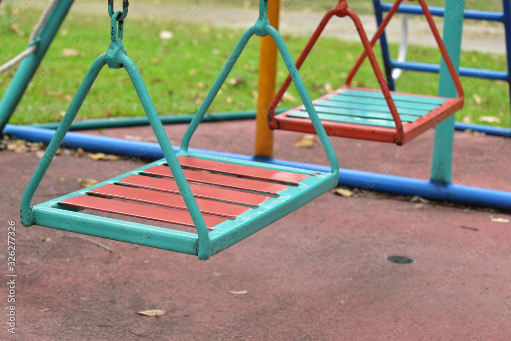 swing steel seat in playground for kid playing in outdoor park swing steel seat in playground for kid playing in outdoor park