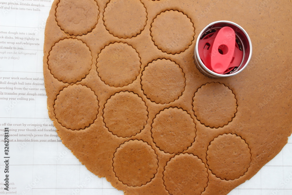 Cutting out cookies from rolled dough. Making homemade cookies, top view Cutting out cookies from rolled dough. Making homemade cookies, top view