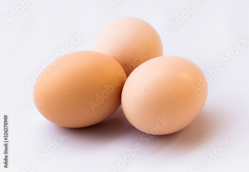 Three eggs on white use for new beginning conception, Happy Easter holidy