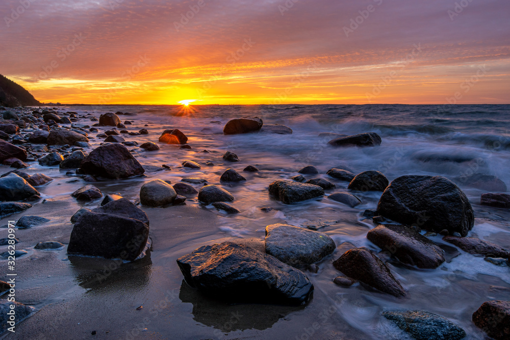 Fiery sunset over the Baltic shore. Fiery sunset over the Baltic shore.