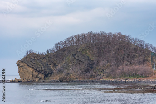 Cape Chashikotsu (Turtle Rock), A rock looks just like a giant turtle in Utoronishi. Town Shari, Shiretoko Peninsula, Hokkaido, Japan photo