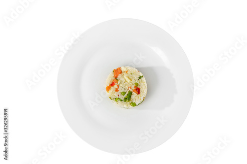 Long grain rice with vegetables, cooked portion of side dish on a plate on a white isolated background, view from above. Appetizing dish for the menu restaurant, bar, cafe