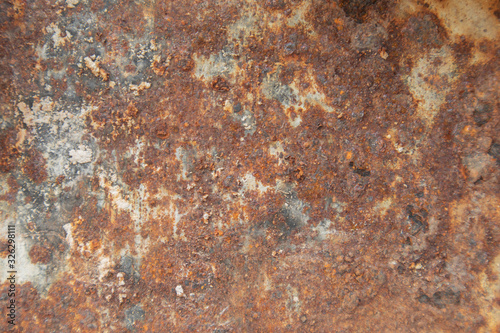 red rusty iron on metal plates. Background and artwork on meta