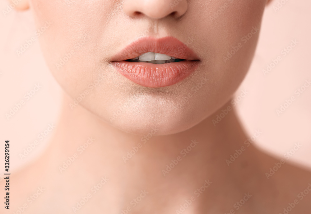 Beautiful young woman on color background, closeup. Concept of plastic surgery Beautiful young woman on color background, closeup. Concept of plastic surgery