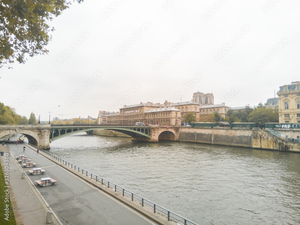 Pont Notre-Dame, Paris, France. Beautiful shot of the bridge on a cloudy day with the 