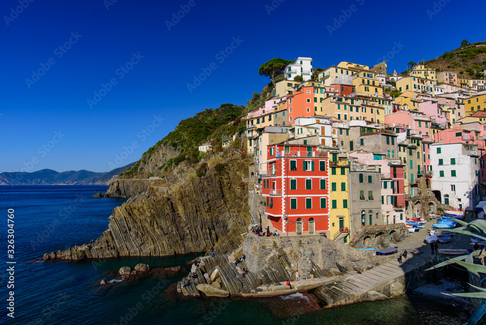 Riomaggiore, one of the five Mediterranean villages in Cinque Terre, Italy, famous for its colorful houses