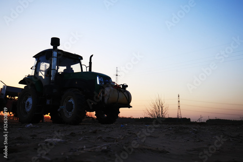 The tractor in farmland farming
