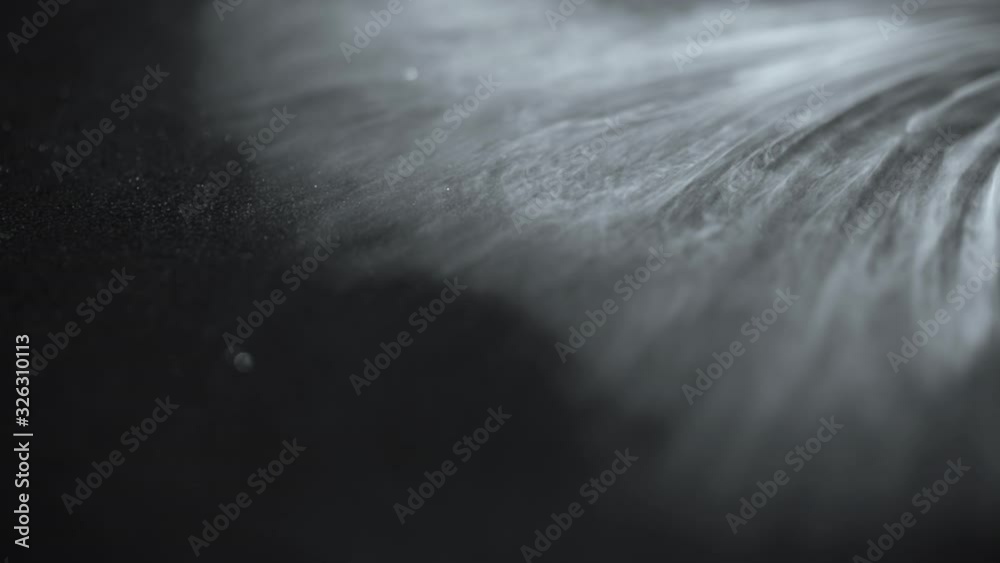 Smoke slow motion on Black background abstract