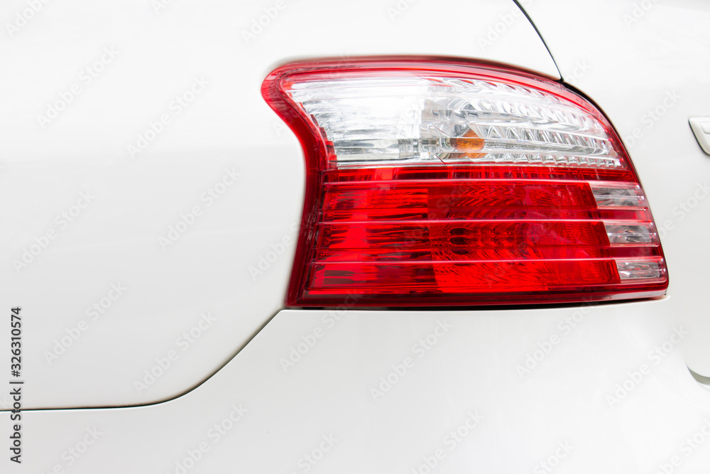 red led taillight on white car