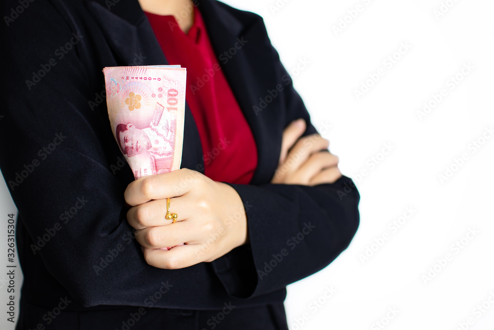 Close-up business woman wearing suit holding thai money notes. Close-up business woman wearing suit holding thai money notes.