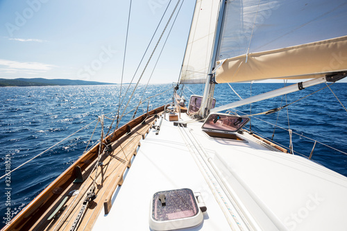 yacht bow in Mediterranean sea in the middle of the sunny summer day