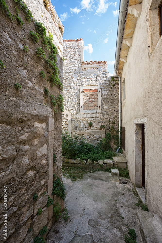 old abandoned houses in ancient town of Plomin, Croatia.