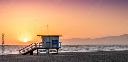 Sunset on the beach in California, Coast Guard rescue shed