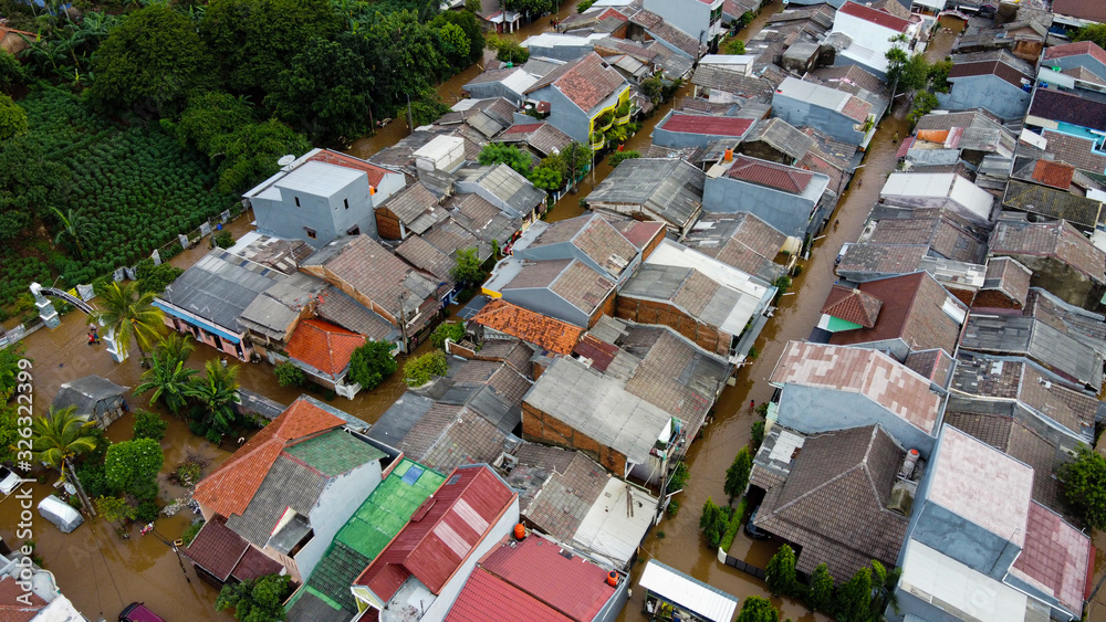 Aerial POV view Depiction of flooding. devastation wrought after massive natural disasters at Bekasi - Indonesia