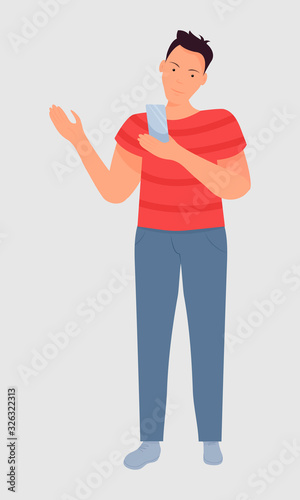 full length young man looks at the screen of a mobile phone. Vector. Separate on a white background. Flat cartoon style. The concept of online communication, work through the phone, using applications