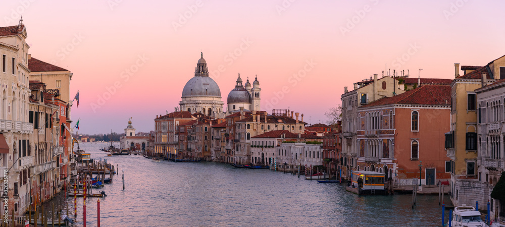 Fototapeta premium Grand Canal with Santa Maria della Salute at background at sunset time, Venice, Italy