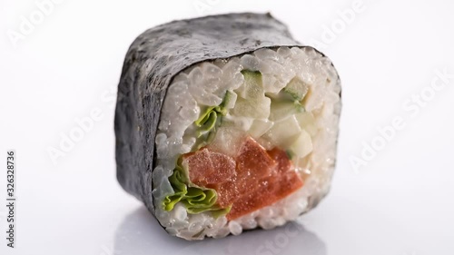 Syake fila maki roll raw salmon with cream cheese and avokado on white photo