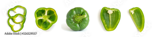 Set of fresh whole and sliced green bell pepper isolated on white background. Top view